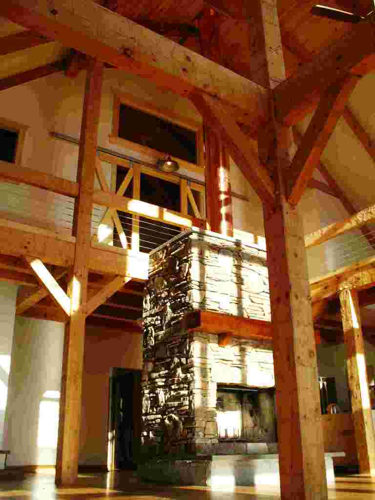 Great Stone Fireplace with Hand Hewn Timbers