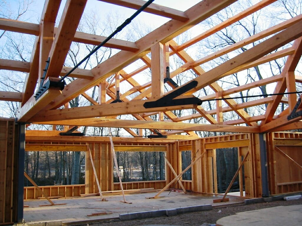 Steel tie rod assembly and center timber truss