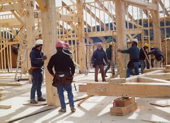 Timber Framers setting Bent in Vermont