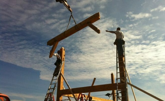 Flying Timber Beam During the Eberhart Barn Construction