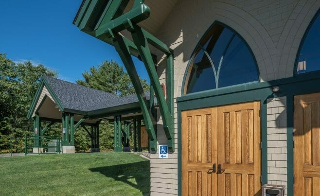 Exterior of Our Lady of the Mountains Church with Porte Cochere in NH
