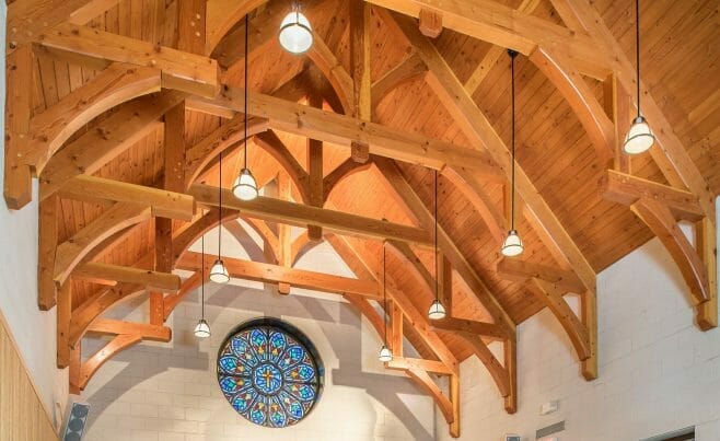 Interior of Westminster Presbyterian Church with Hammer Trusses and Stained Glass window