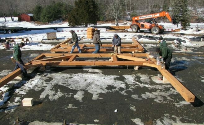 Timber Framers Preparing to Raise Dining Hall Frame