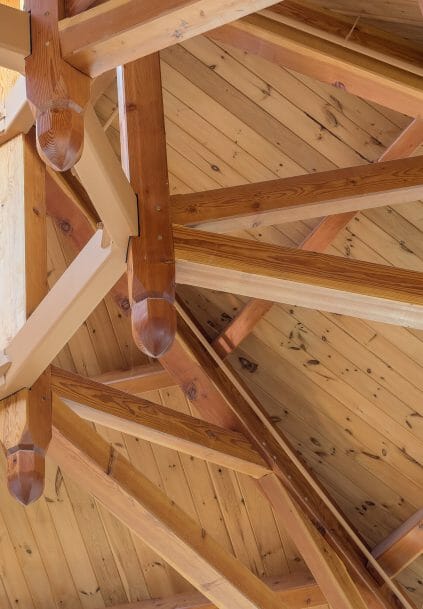 Close up of the steel compression ring and timbers in the Octagon Timber Frame in the Chapel for Holy Apostles