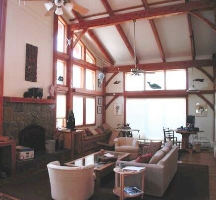 Cathedral Ceiling with Timber Beams and Big Windows