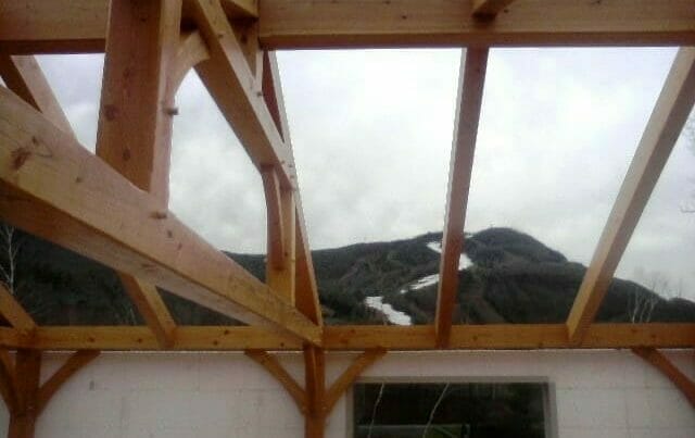 Timber Rafters With a Great View of a Ski Mountain