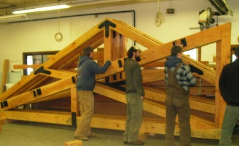 Vermont Timber Workers Assembling Trusses