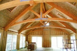 Interior View of a Pool House with Arched King Post Trusses