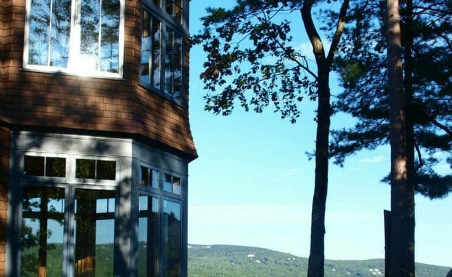 Adirondack Style Exterior of a Home with a Post & Beam Interior