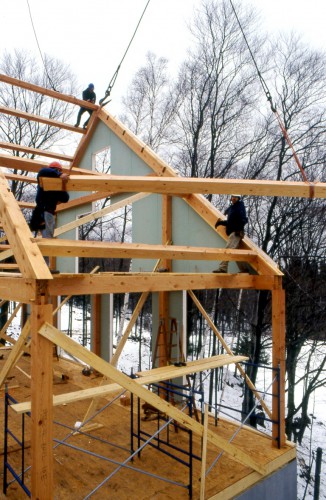 timber-frame-assembly-raising-purlin-installation