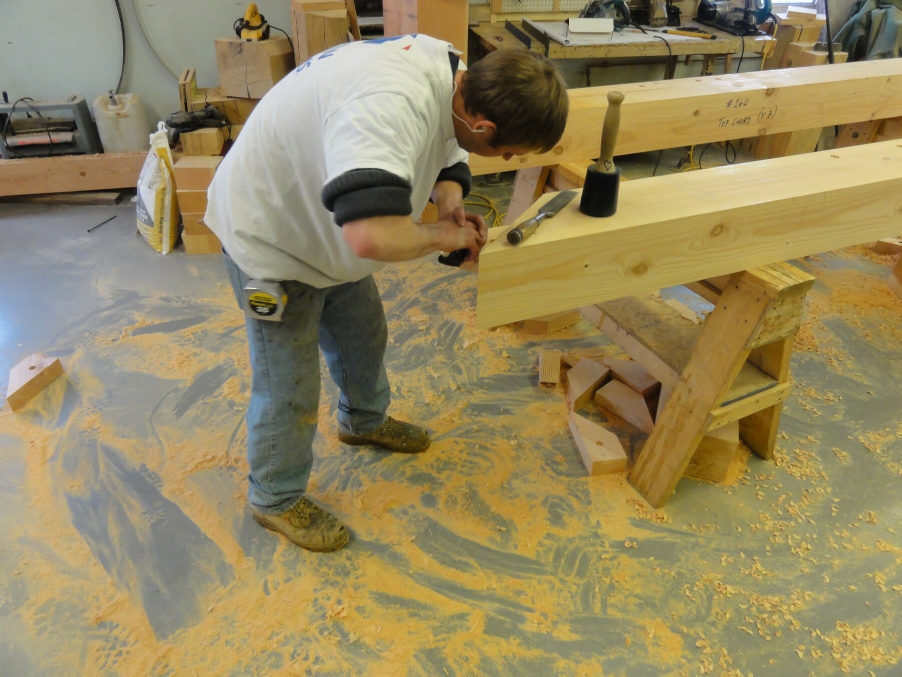 Jake cleaning up a tenon.