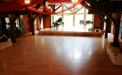 Curved Timber Braces in the Interior of a Post & Beam Constructed Building