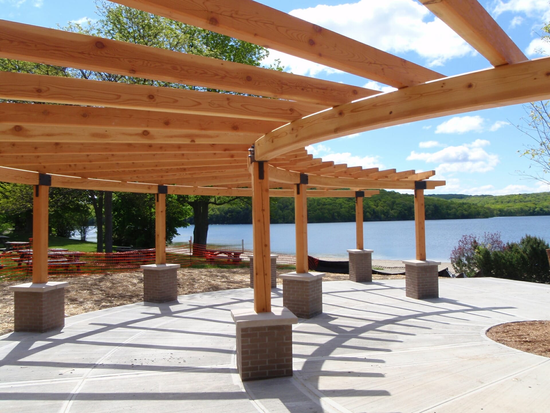 Beautiful Curved Timber Pergola Overlooking a Lake