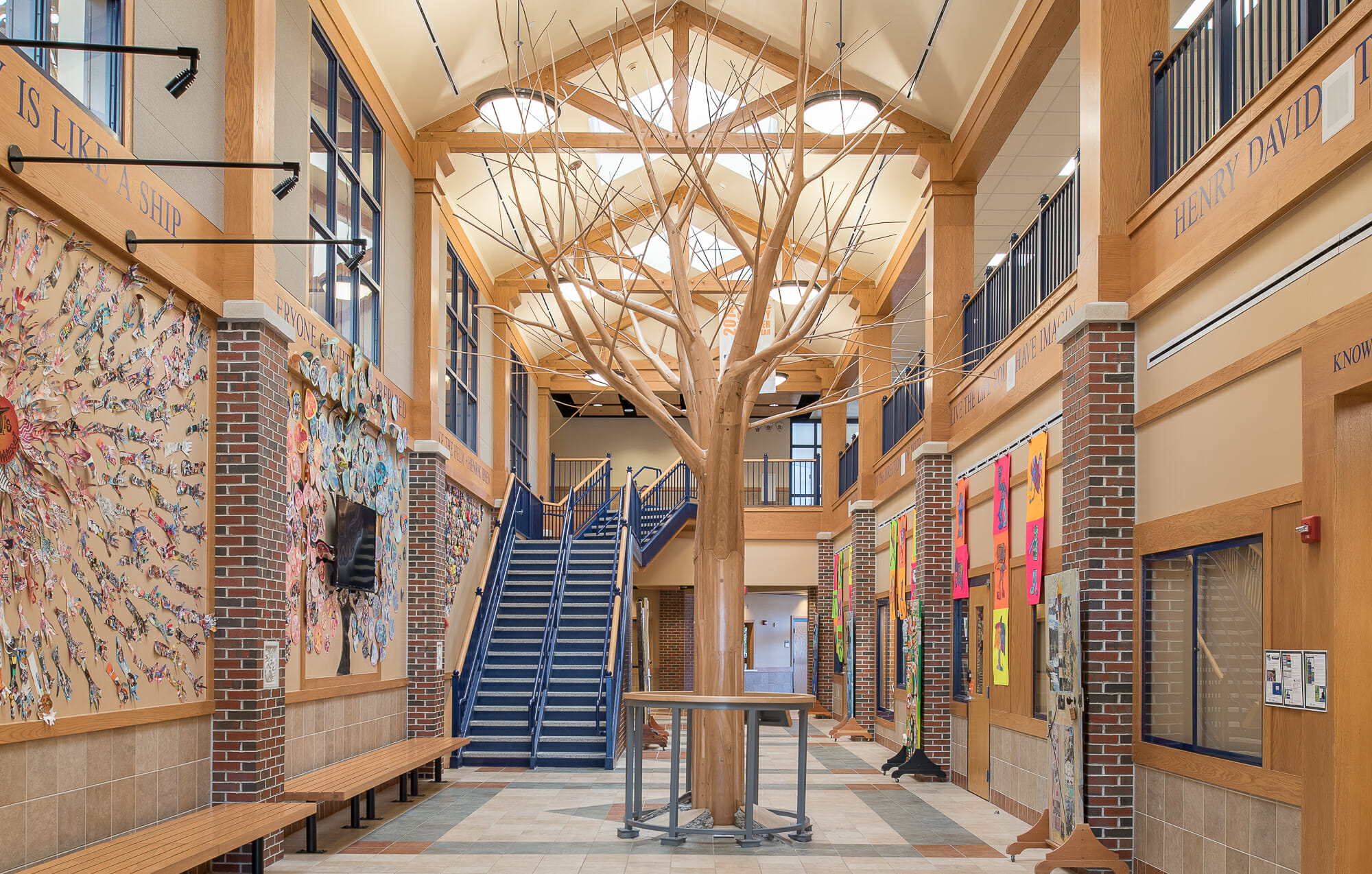 Interior of Westbrook Middle School with King post trusses in ME