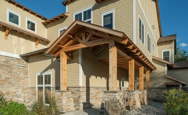 Heavy Timber Porte Cochere Entry Way with King Posts Outside of a Pediatric Dentist Office