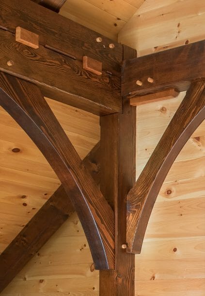 Black Cherry Keys and Steel Straps on Timber Beams in a Barn Style Home in NH