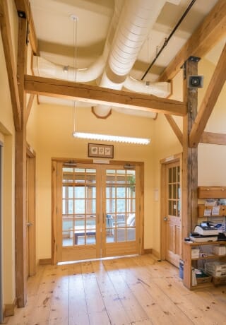 Interior Entry Way with Posts and Beams in the Badger Balm Factory in Gilsum, NH