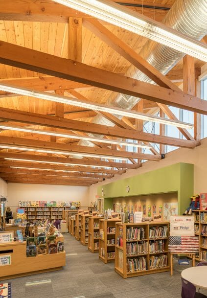 Interior of the Library with Timber Trusses in the Rippowam Cisqua School in NY.