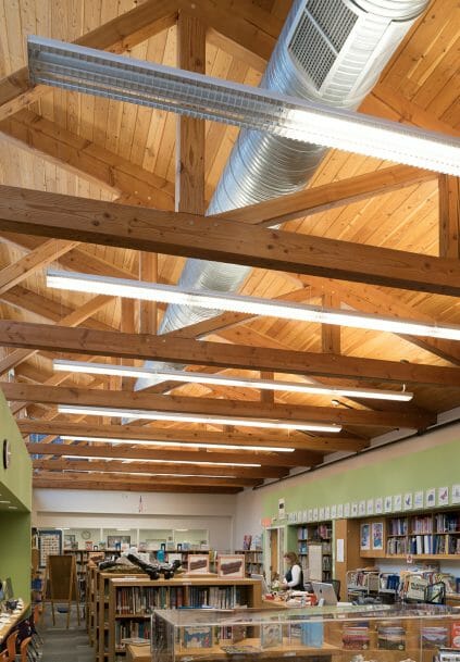 Interior of the Library with Timber Trusses in the Rippowam Cisqua School in NY.