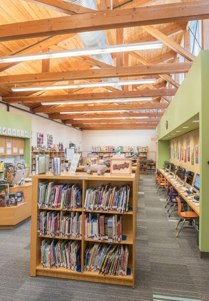 Interior of the Library with Timber Trusses in the Rippowam Cisqua School in NY.