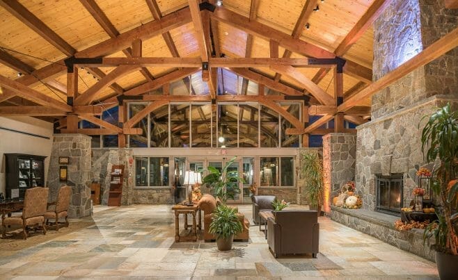 Interior of the Doubletree hotel Lobby with Timber Trusses and stone post bases.