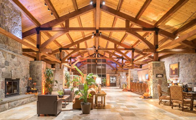 Interior of the Doubletree hotel Lobby with Timber Trusses and stone post bases.