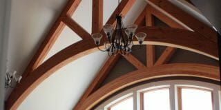 Arched Timber Trusses in the Interior of the Daignault residence in Adams, MA