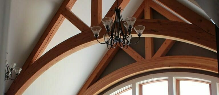 Arched Timber Trusses in the Interior of the Daignault residence in Adams, MA