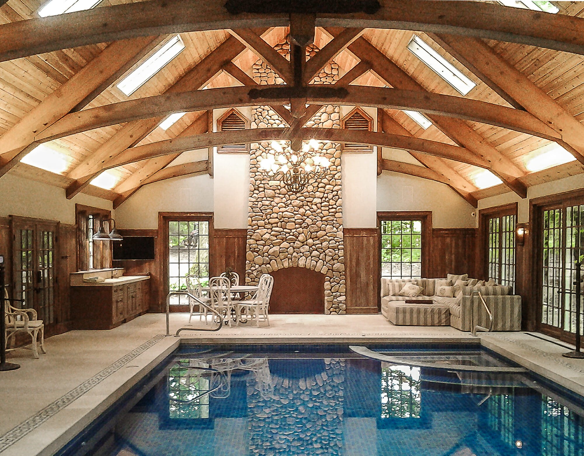 Timber Frame Arched Trusses Indoor Pool House in OH. Reed Pool House.