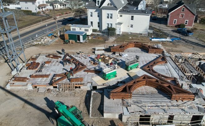 Arches laid out before being raised into place at The Church of St. Michael the Archangel