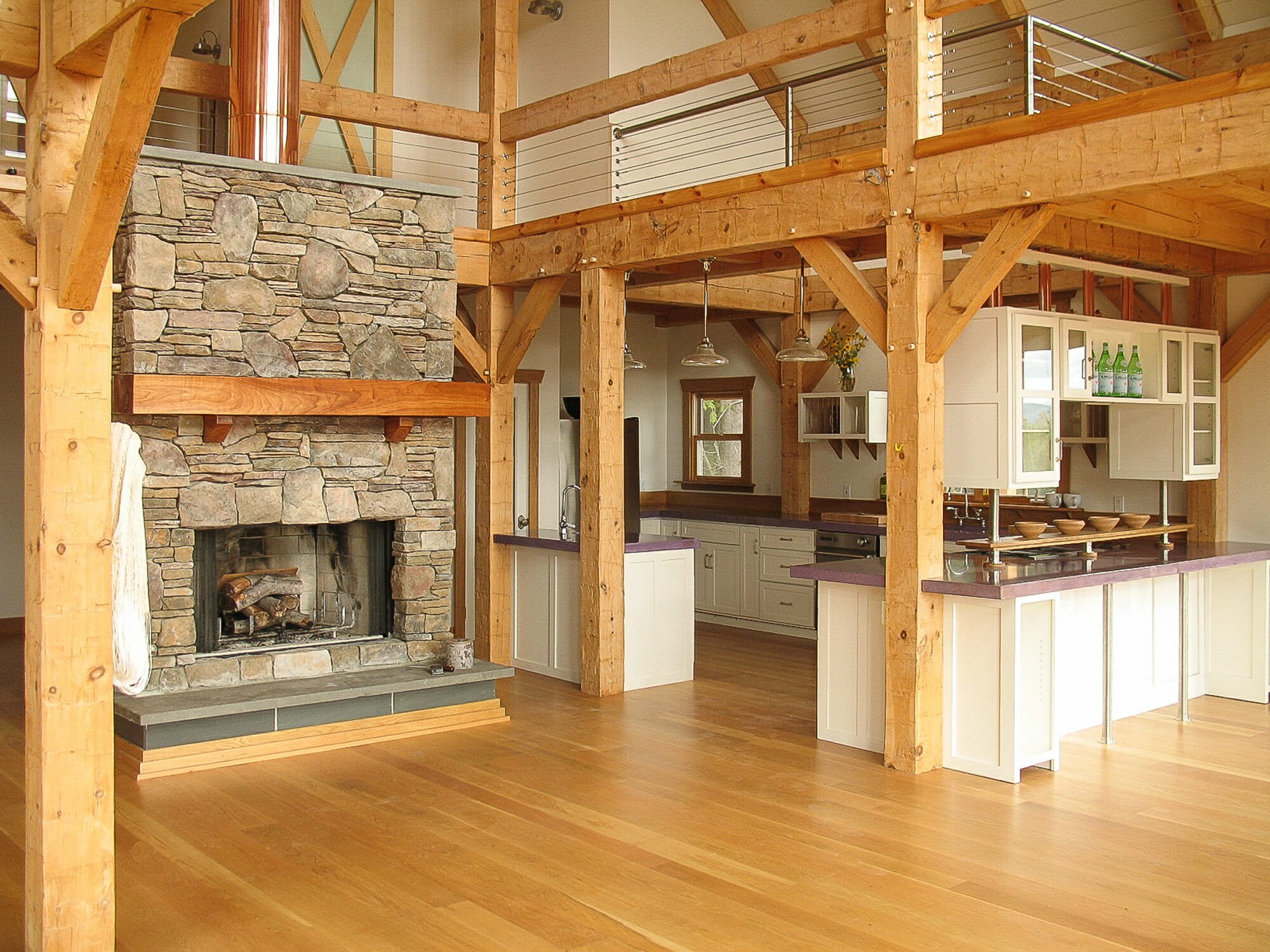 Hand Hewn Beams in Barn Style Home Kitchen. Jupiter Barn Kitchen