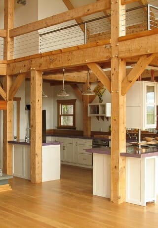 Hand Hewn Beams in Barn Style Home Kitchen. Jupiter Barn Kitchen