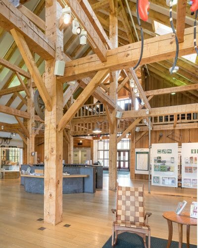 Hand hewn post and beam timber frame barn interior in the Southern Vermont Welcome Center