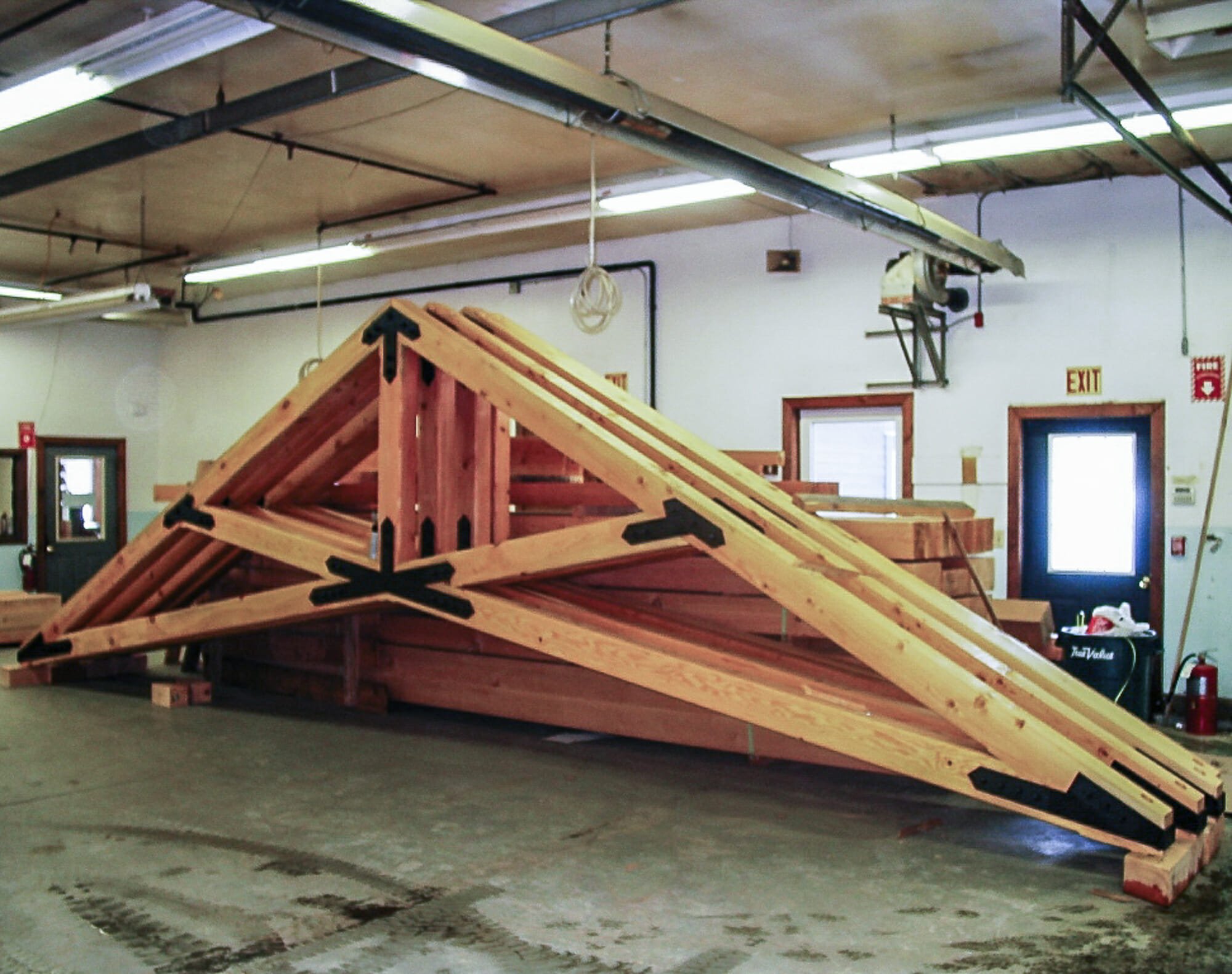 Fabricated Scissor Trusses with steel plates in the Workshop for Grace Episcopal Church