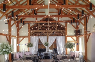 Dining Room in a Timber Frame Event Barn decorated for a wedding