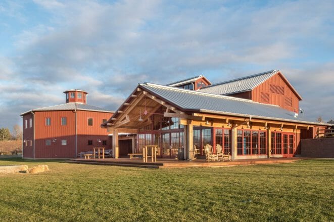 Exterior of a Heavy Timer Cider Factory with an Octagon Frame and Red Steel Accents