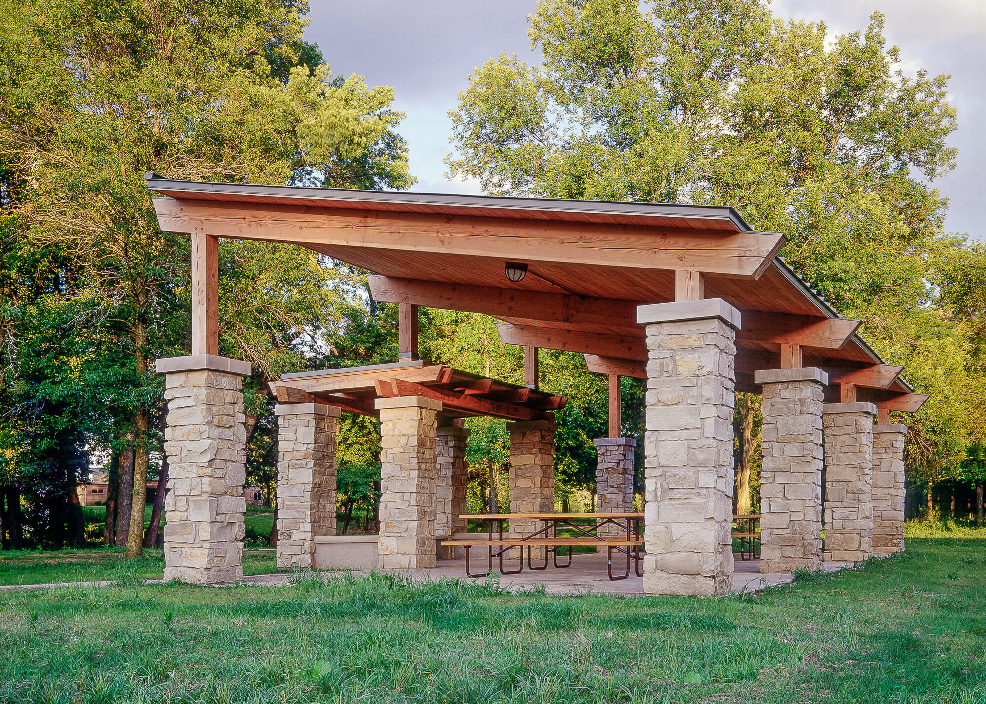 Timber Frame Picnic Shelter with stone post bases at Citizen's Park in Barrington, Illinois