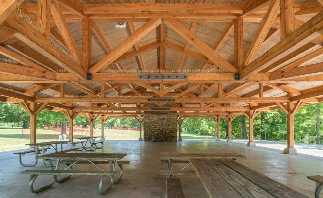 Timber Frame Trusses with steel connecting plates in an outdoor Picnic Shelter