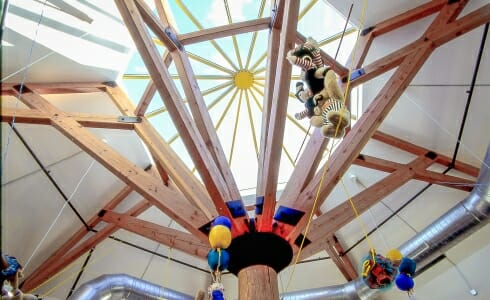 Post and trusses with steel joinery in the Vermont Teddy Bear Factory