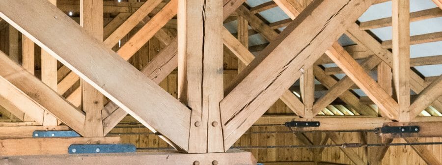 Oak Timber Frame with Steel Tie Rods in Traditional Rich Barn