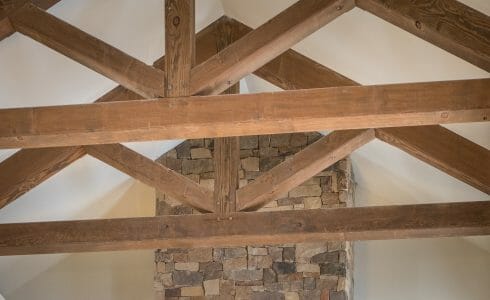 The King Post Trusses in the Christina Seix Academy in Trenton, NJ were made with Kiln-dried Douglas fir. The King Post Trusses highlight the cathedral ceiling and tall stone fireplace.