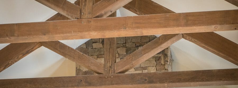 The King Post Trusses in the Christina Seix Academy in Trenton, NJ were made with Kiln-dried Douglas fir. The King Post Trusses highlight the cathedral ceiling and tall stone fireplace.