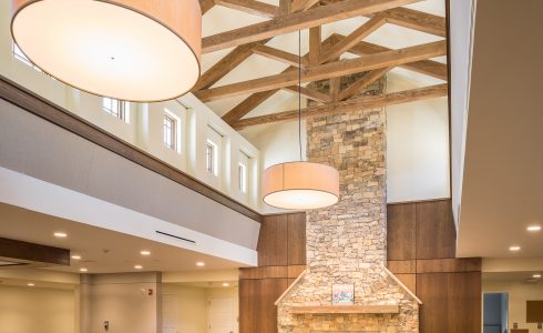 The King Post Trusses in the Christina Seix Academy in Trenton, NJ were made with Kiln-dried Douglas fir. The King Post Trusses highlight the cathedral ceiling and tall stone fireplace.