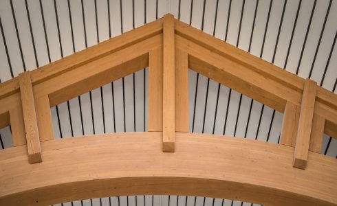 The Mahamudra Buddhist Retreat in Cragsmoor, NY has a heavy timber entry way and interior trusses fabricated from Glulam and Douglas Fir