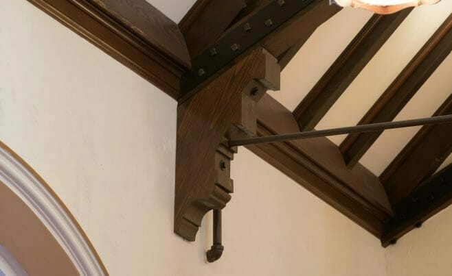 Decorative Corbel under truss with steel tie rod