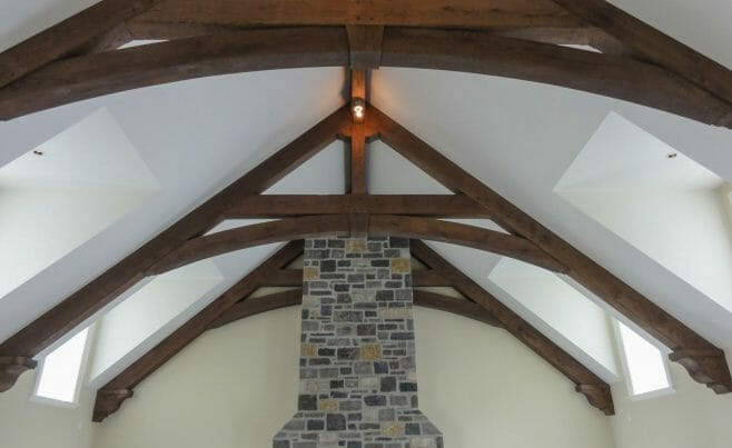 Decorative Corbels on Trusses above a stone fireplace