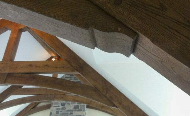 Dark Stained Timber Trusses with Scrolls