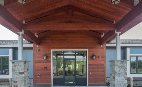 The Porte Cochere at Harmony Homes features Douglas fir Glulam Arches