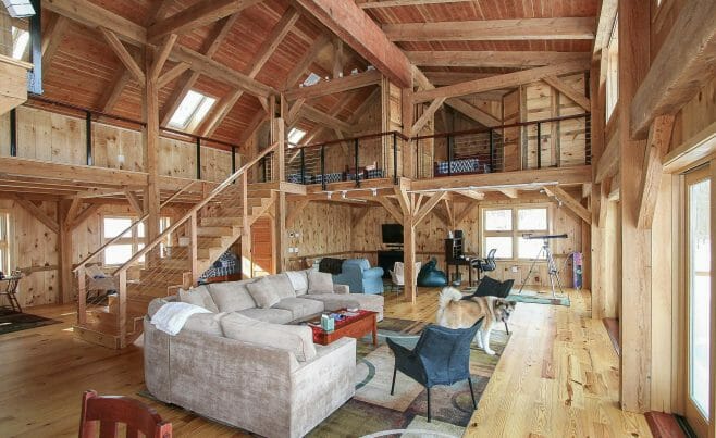 Timber frame house with open floor plan and large living room