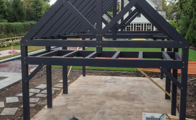 Backyard pool house barn stained gray with tool room and loft